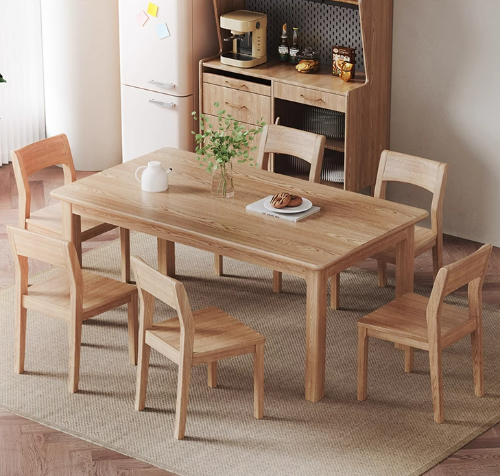 Nordic solid wood dining table and chairs set for small households.